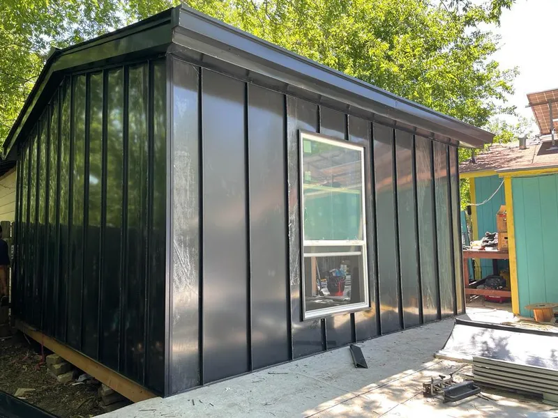 Black standing seam metal wall panels for Metal Roof Installation in Sharon